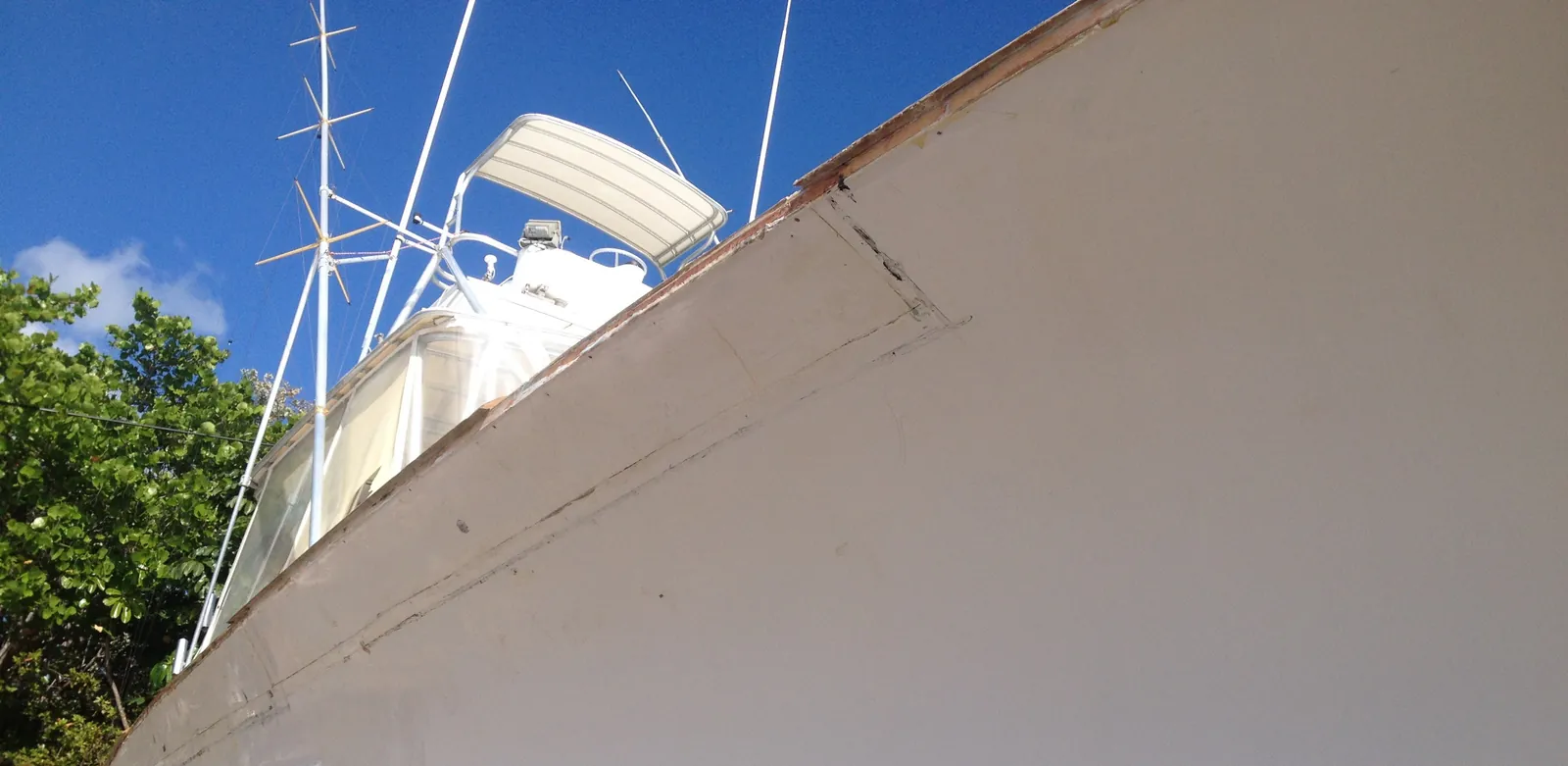 Faired and finished surface after fiberglass core replacement on the Blackwell hull