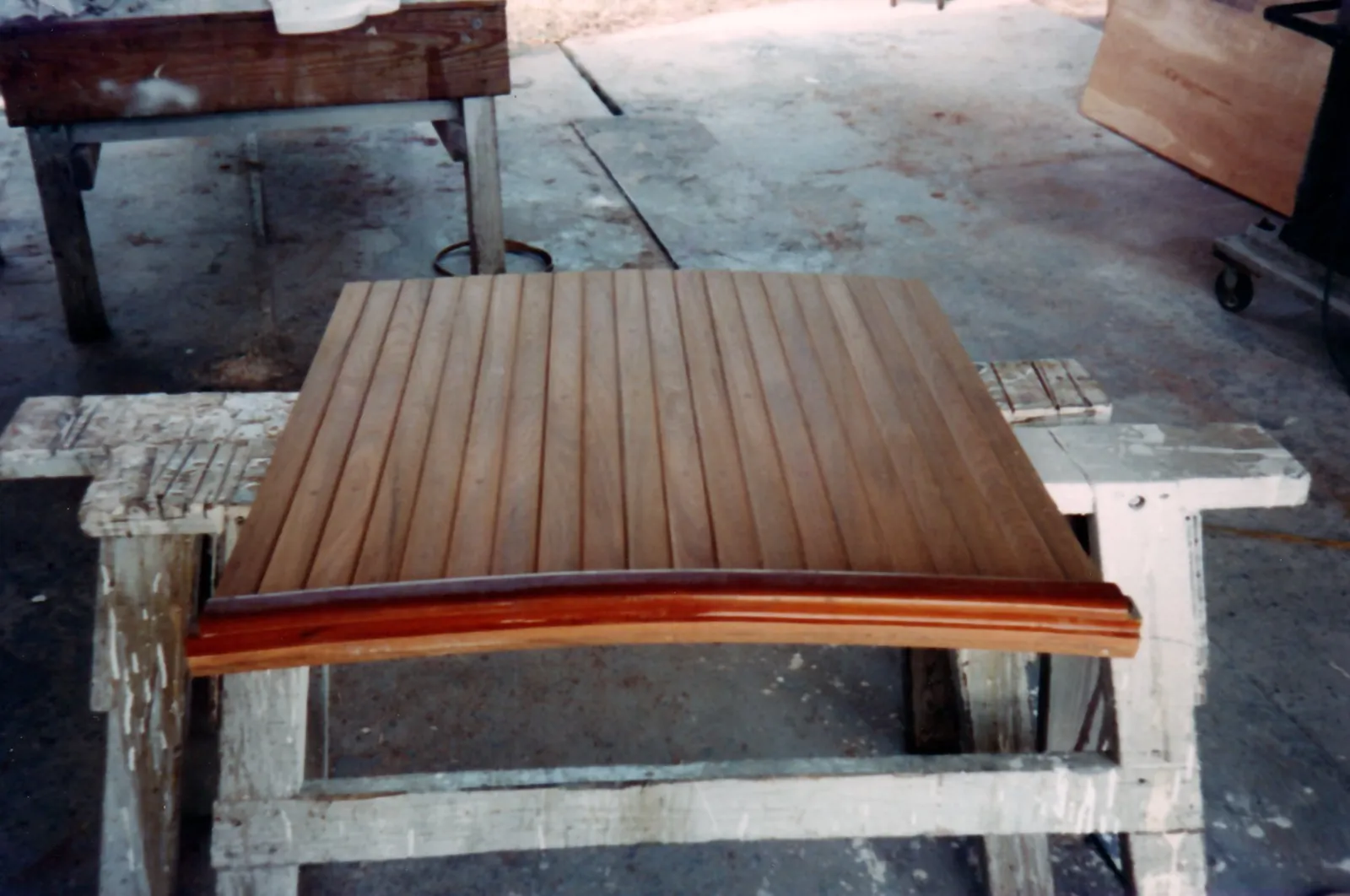 Varnished teak hatch panel finished in the shop