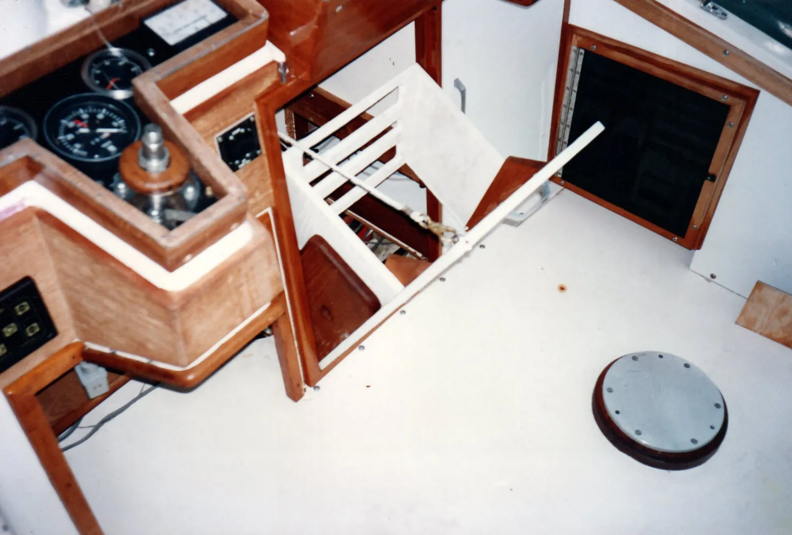 Teak-wrapped flybridge console on a 45-foot sportfishing boat